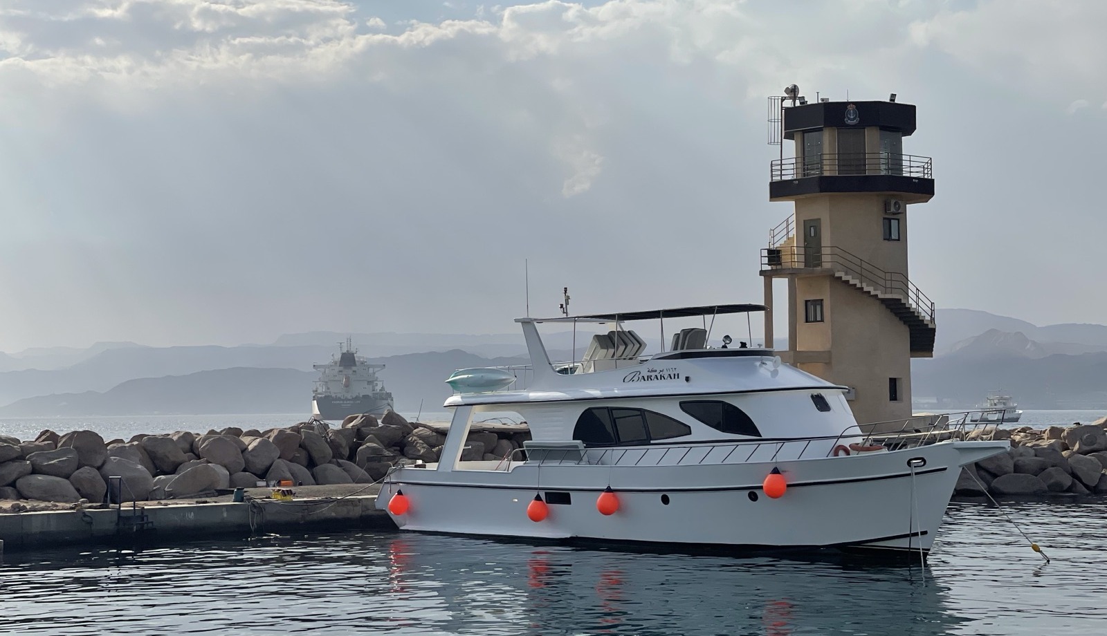 Barakah moored near Aqaba's lighthouse at sunrise